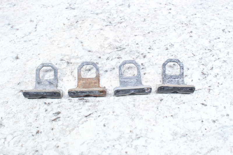 Four metal latch plates.
