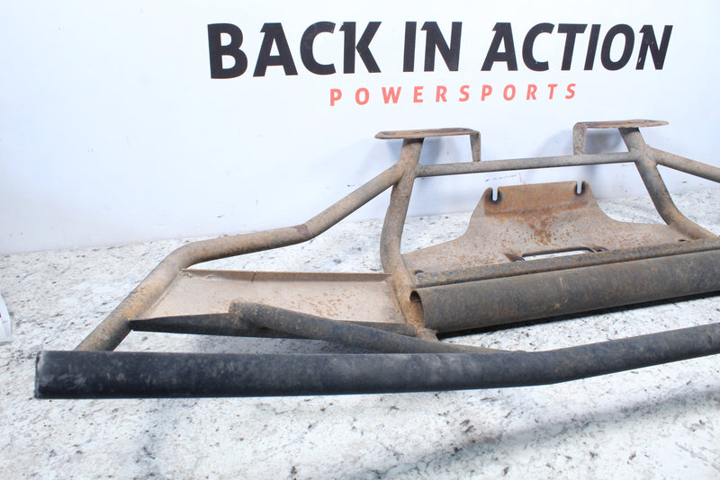 Rusty metal ATV bumper.