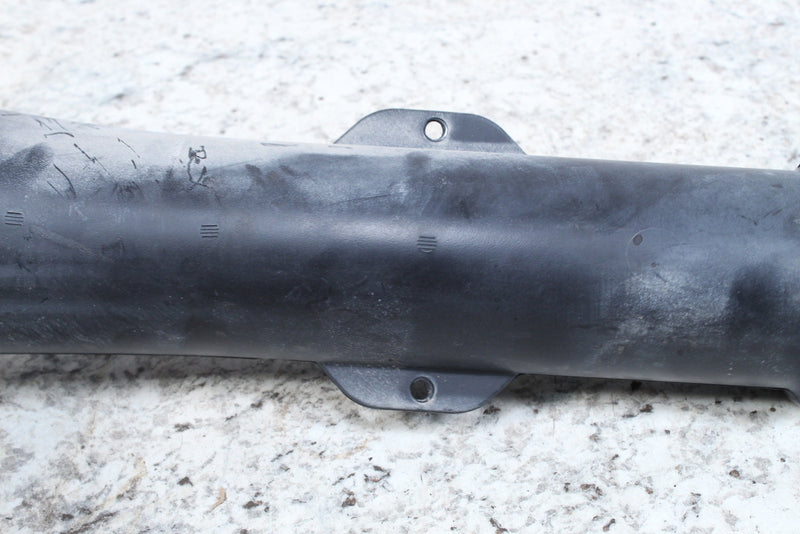 Black cylindrical plastic component.