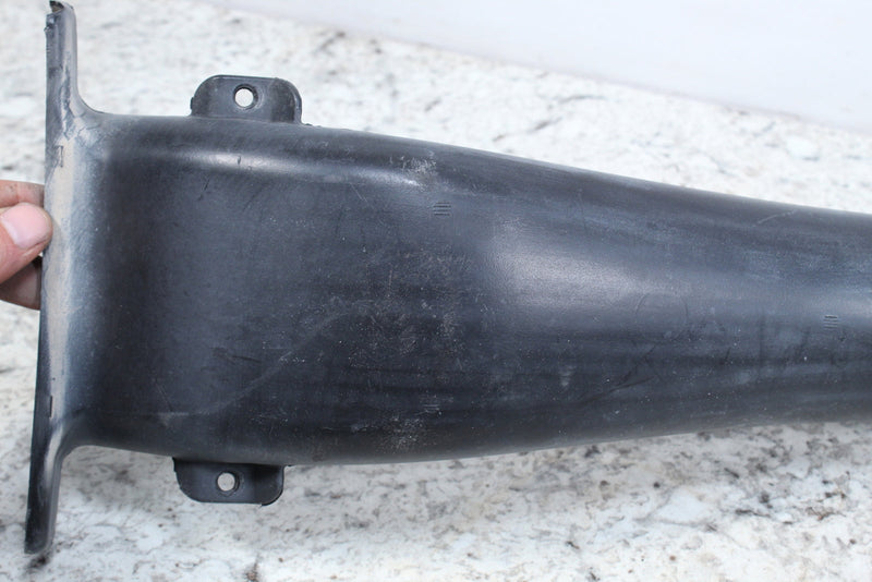 Black plastic automotive part.