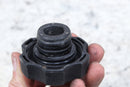 Black plastic radiator cap.