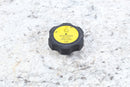 Black and yellow radiator cap.