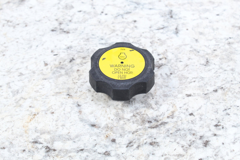 Black and yellow radiator cap.