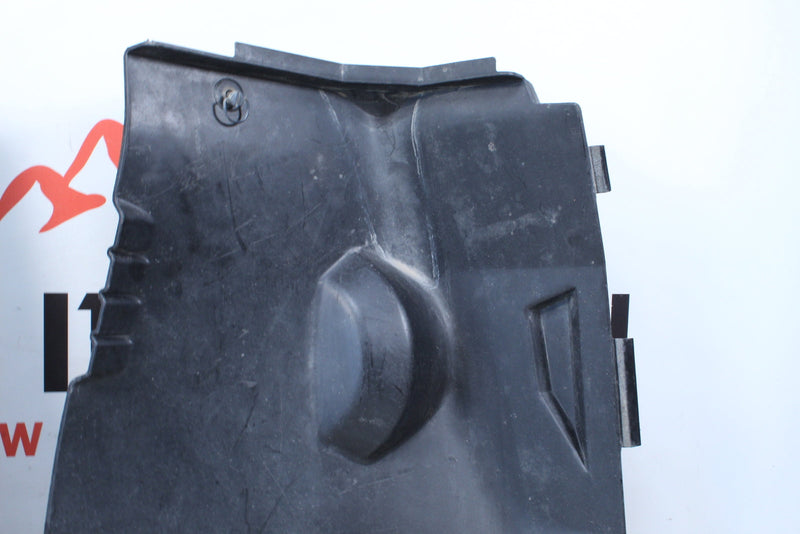 Black plastic automotive part.