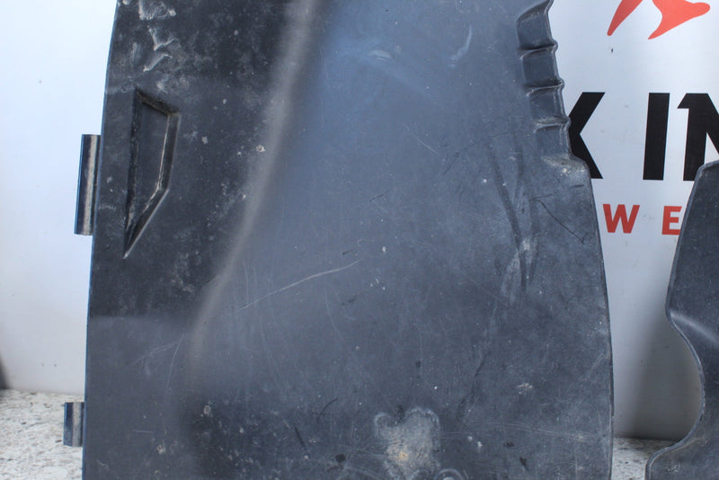 Black plastic automotive part.