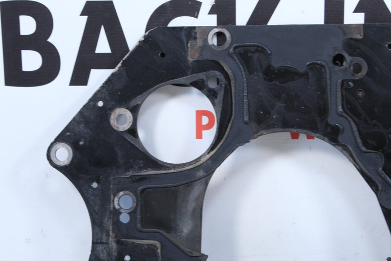 Black metal frame with circular openings.