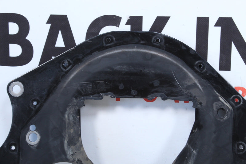 Black metal automotive part.