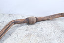 Rusted exhaust pipe with catalytic converter.