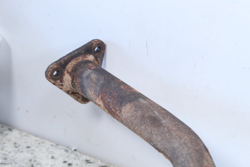 Rusty exhaust pipe with flange.