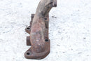 Rusty, used exhaust manifold.