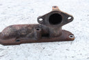Rusty cast iron exhaust manifold.