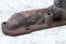 Rusty, used exhaust manifold.