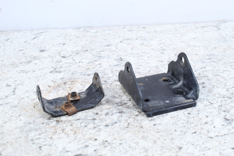 Two black metal brackets.