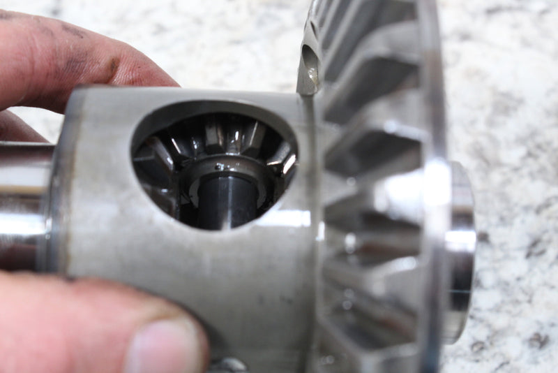 Shiny metal differential gear assembly.