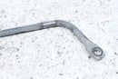 Bent metal bar with mounting hole.