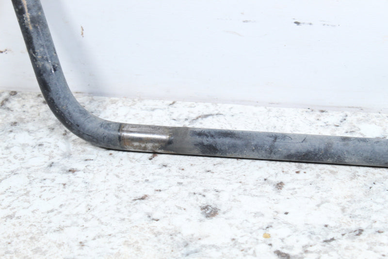 Curved, gray metal bar.