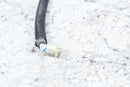 Black cable with white connector.