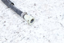 Black hose with white plastic connector.