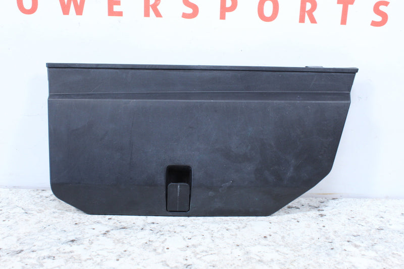 Black plastic panel with handle.