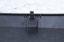 Black plastic latch mechanism.
