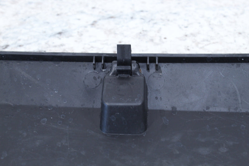 Black plastic latch mechanism.