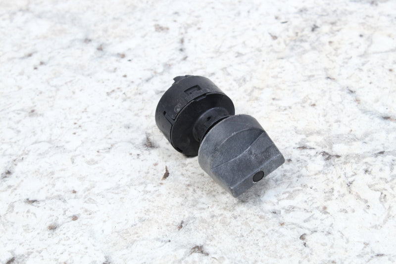 Black and gray rotary switch.