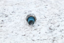 Metal bolt with blue seal.