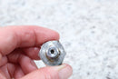 Metal nozzle with a small hole.