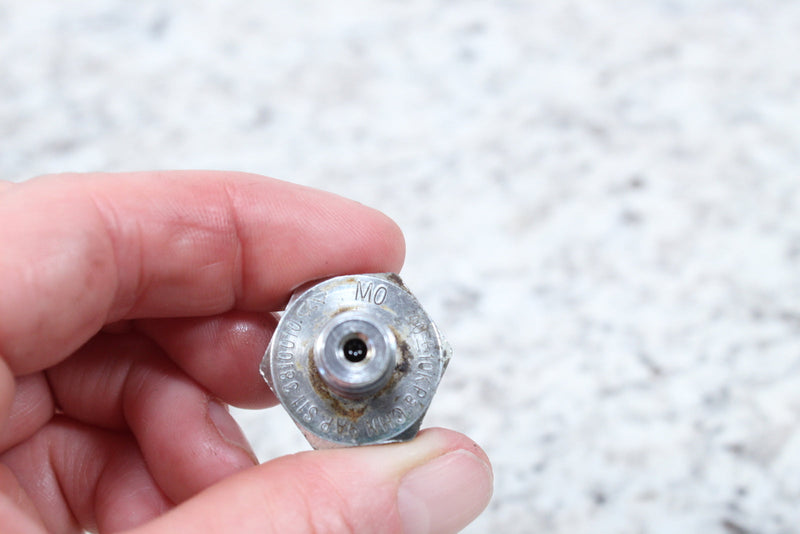 Metal nozzle with a small hole.