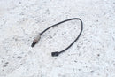 Oxygen sensor with electrical connector.