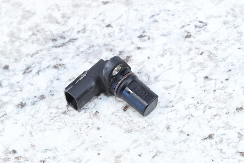Black plastic automotive sensor.