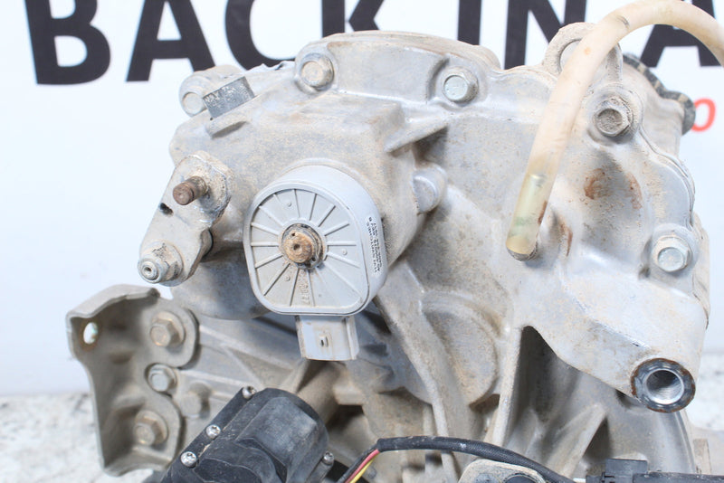 Used, dirty, and complex mechanical component.