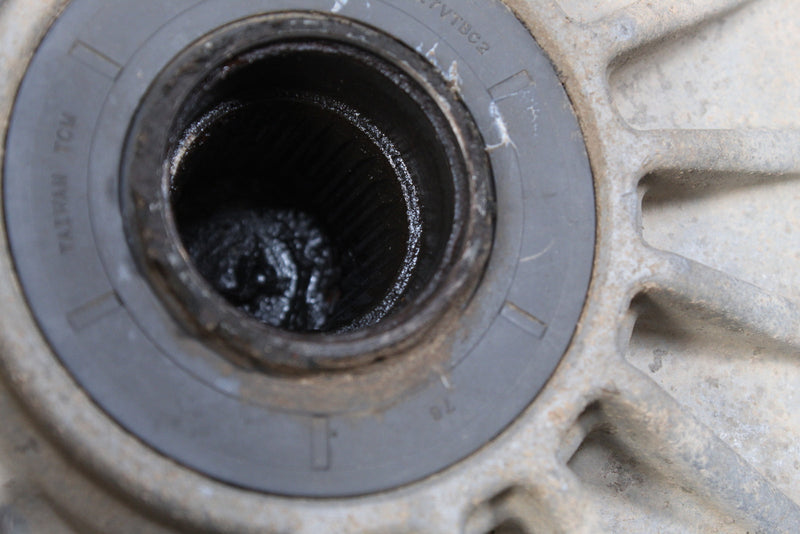 Worn metal bearing housing.