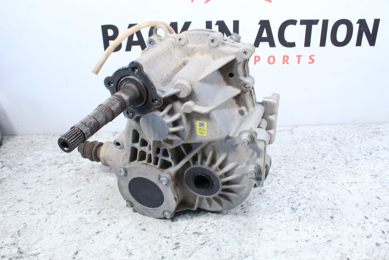 Gray metal differential with protruding shaft.