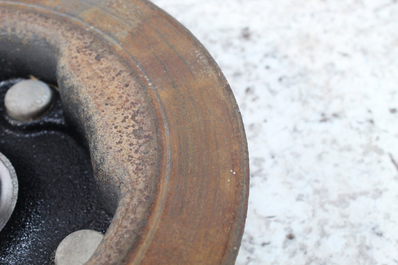 Rusted, used brake drum.