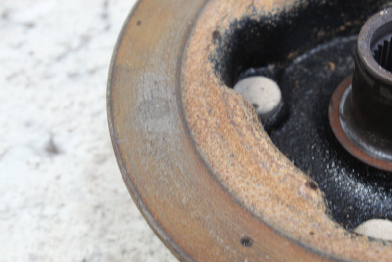 Rusted, used brake rotor.