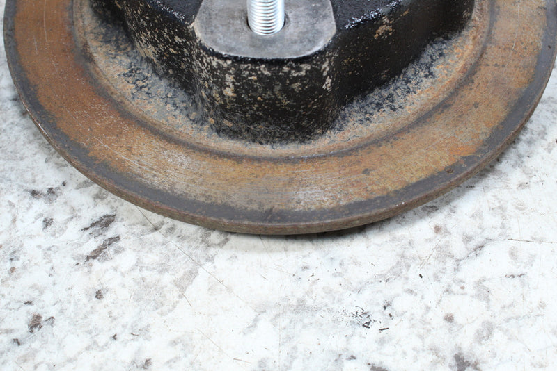 Rusty, used metal pulley.