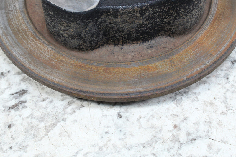 Rusted and worn brake rotor.